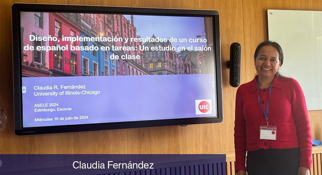 Claudia Fernandez stands next to a presentation she gave at a conference in Edinburgh, Scotland, in July 2024.